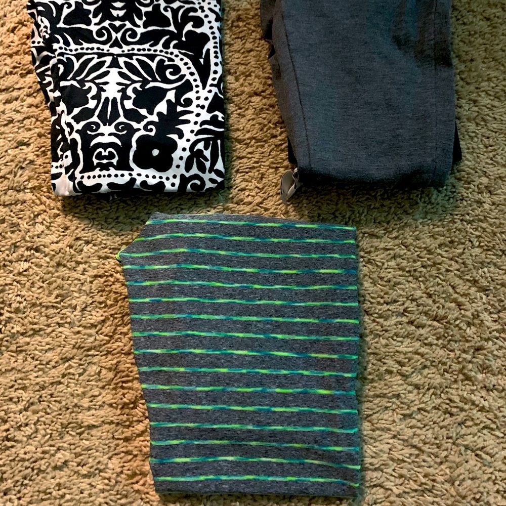 Three pairs of leggings. Athletic gear